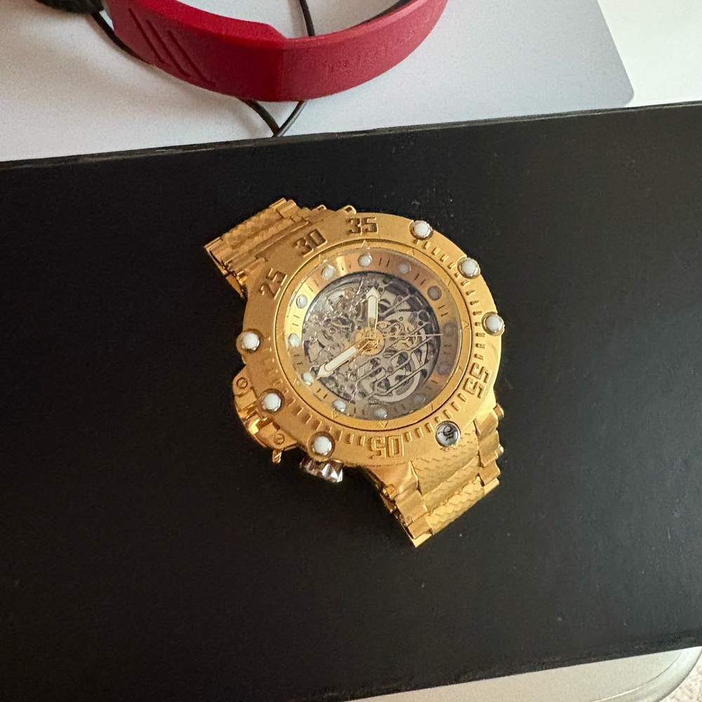 Invicta Gold Skeleton Dial Watch